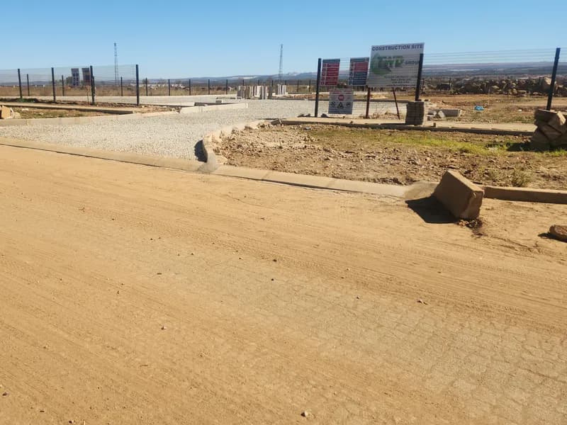 Kerbed access road taking shape