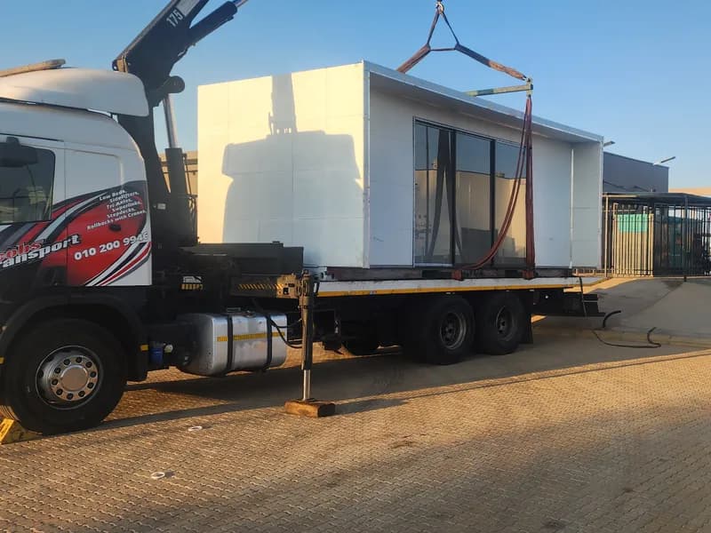 A finished unit lifted onto the truck
