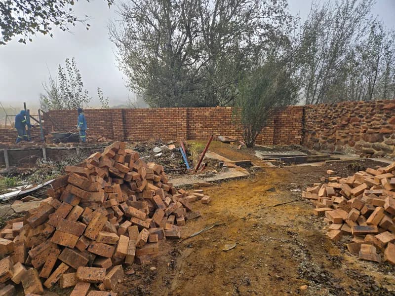 Clearing brick rubble before the build