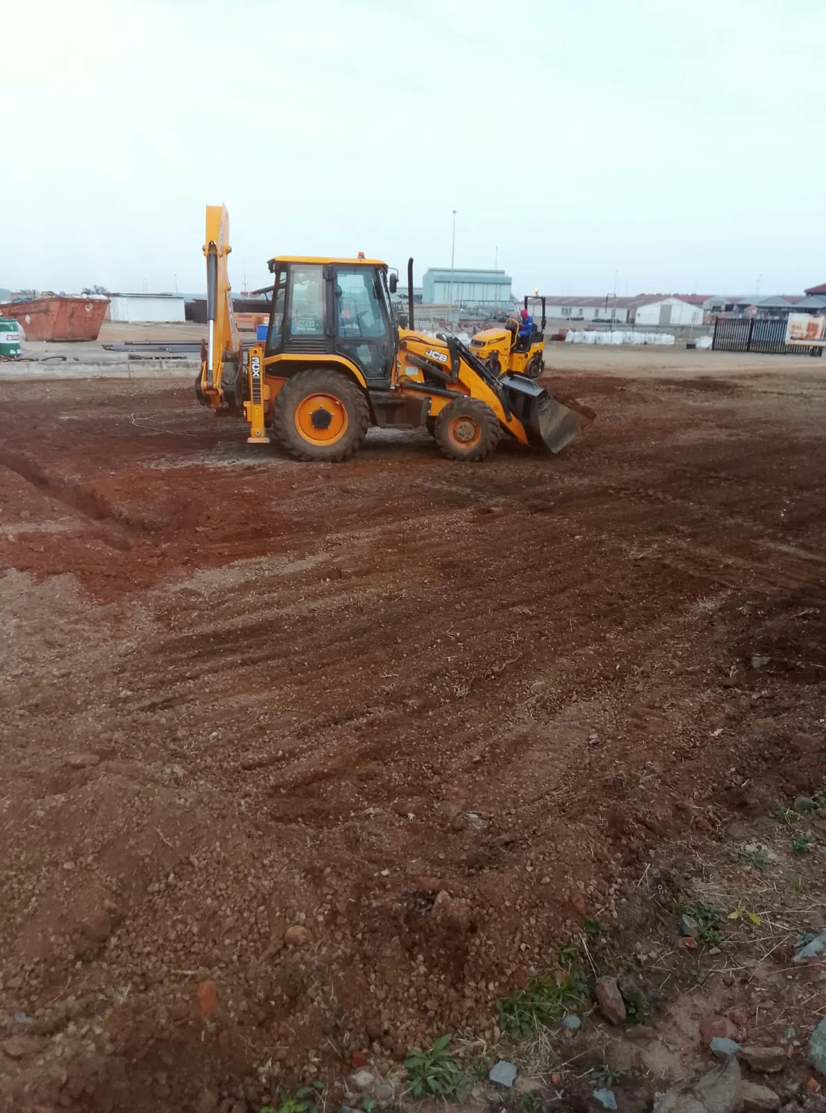 A TLB levelling a cleared site