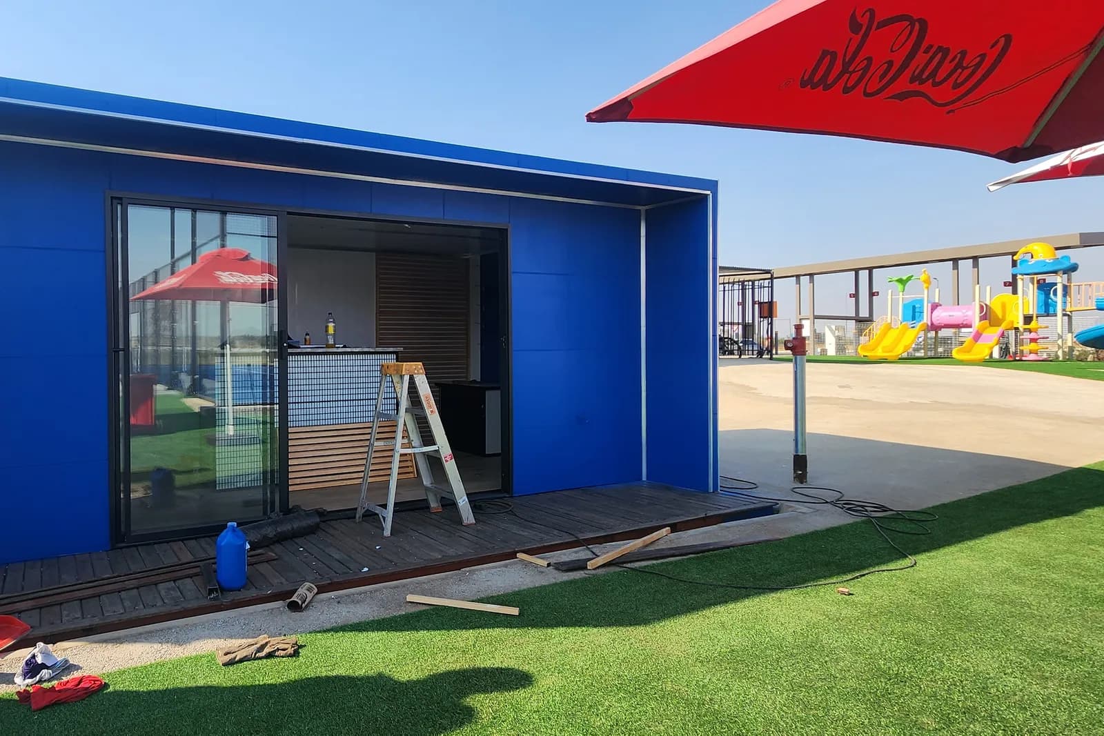 A converted container finished in blue on site